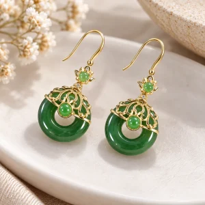 Boucles d’oreilles pendantes en jade, disques percés sur crochets