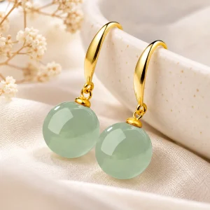 Boucles d’oreilles en jade plaqué or, grosse perle