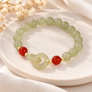 Bracelet de jade et agate rouge, anneaux entrelacés