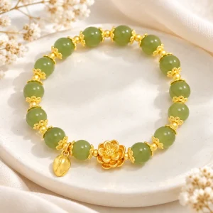 Bracelet de jade à fleur de lotus dorée