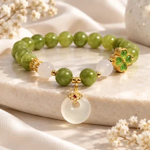 Bracelet de jade vert olive et disque blanc
